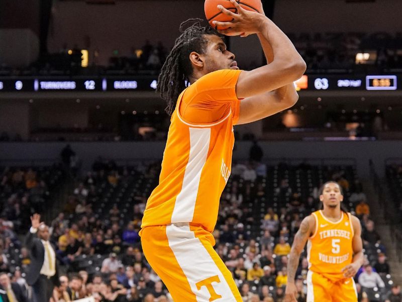 Feb 20, 2024; Columbia, Missouri, USA; Tennessee Volunteers forward Jonas Aidoo (0) shoots a three point attempt against the Missouri Tigers during the second half at Mizzou Arena. Mandatory Credit: Denny Medley-USA TODAY Sports