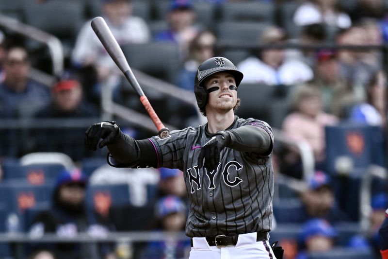 May 11, 2024; New York City, New York, USA; New York Mets third baseman Brett Baty (22) reacts after striking out against the Atlanta Braves during the fifth inning at Citi Field. Mandatory Credit: John Jones-USA TODAY Sports