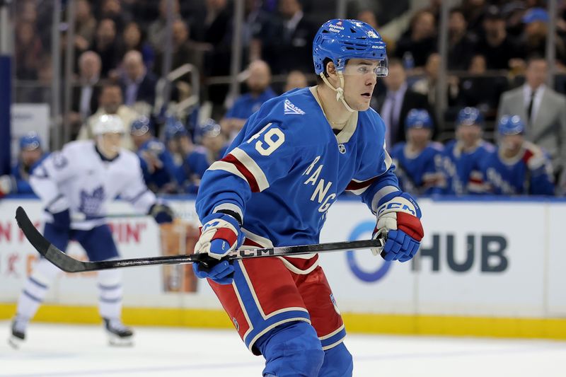 Mar 5, 2026; New York, New York, USA; New York Rangers right wing Jaroslav Chmelar (49) skates against the Toronto Maple Leafs during the third period at Madison Square Garden. Mandatory Credit: Brad Penner-Imagn Images Mar 5, 2026; New York, New York, USA; New York Rangers right wing Jaroslav Chmelar (49) skates against the Toronto Maple Leafs during the third period at Madison Square Garden. Mandatory Credit: Brad Penner-Imagn Images
