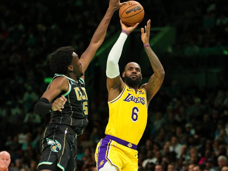 CHARLOTTE, NC - JANUARY 2: LeBron James #6 of the Los Angeles Lakers shoots the ball against the Charlotte Hornets on January 2, 2023 at Spectrum Center in Charlotte, North Carolina. NOTE TO USER: User expressly acknowledges and agrees that, by downloading and or using this photograph, User is consenting to the terms and conditions of the Getty Images License Agreement. Mandatory Copyright Notice: Copyright 2023 NBAE (Photo by Brock Williams-Smith/NBAE via Getty Images)