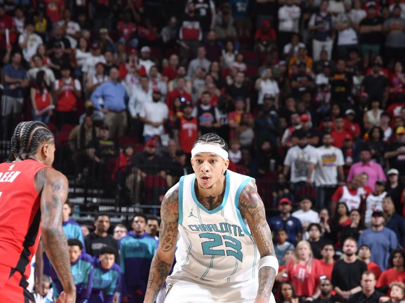 HOUSTON, TX - OCTOBER 23:  Tre Mann #23 of the Charlotte Hornets dribbles the ball during the game against the Houston Rockets during a regular season game on October 23, 2024 at the Toyota Center in Houston, Texas. NOTE TO USER: User expressly acknowledges and agrees that, by downloading and or using this photograph, User is consenting to the terms and conditions of the Getty Images License Agreement. Mandatory Copyright Notice: Copyright 2024 NBAE (Photo by Logan Riely/NBAE via Getty Images)