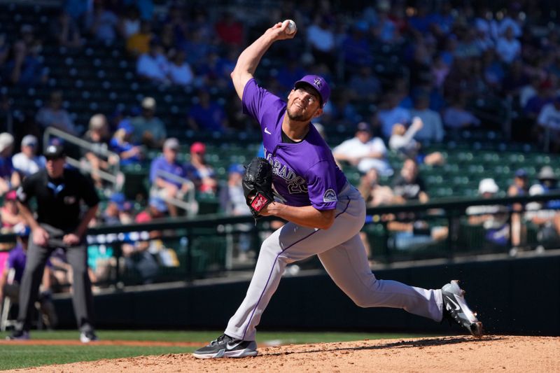 Feb 29, 2024; Mesa, Arizona, USA; Colorado Rockies relief pitcher Peter Lambert (20) throws against the Chicago Cubs in the second inning at Sloan Park. Mandatory Credit: Rick Scuteri-USA TODAY Sports