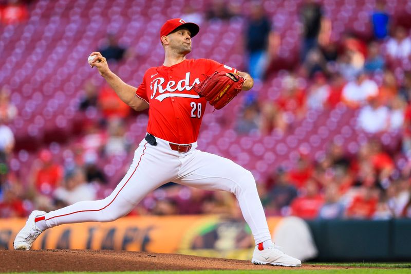 Sep 4, 2024; Cincinnati, Ohio, USA; Cincinnati Reds starting pitcher Nick Martinez (28) pitches against the Houston Astros in the first inning at Great American Ball Park. Mandatory Credit: Katie Stratman-Imagn Images