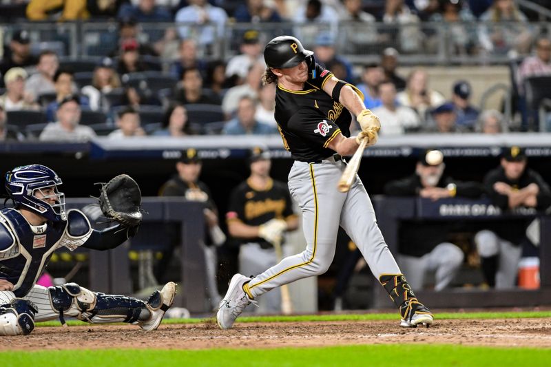 Sep 27, 2024; Bronx, New York, USA; Pittsburgh Pirates third baseman Billy Cook (28) hits a single against the New York Yankees during the eighth inning at Yankee Stadium. Mandatory Credit: John Jones-Imagn Images