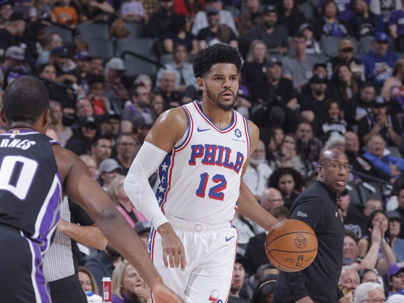 SACRAMENTO, CA - MARCH 25: Tobias Harris #12 of the Philadelphia 76ers handles the ball during the game  on March 25, 2024 at Golden 1 Center in Sacramento, California. NOTE TO USER: User expressly acknowledges and agrees that, by downloading and or using this Photograph, user is consenting to the terms and conditions of the Getty Images License Agreement. Mandatory Copyright Notice: Copyright 2024 NBAE (Photo by Rocky Widner/NBAE via Getty Images)