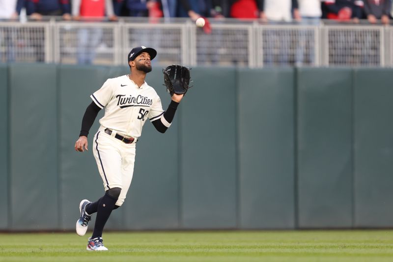 Oct 11, 2023; Minneapolis, Minnesota, USA; Minnesota Twins left fielder Willi Castro (50) makes catch for an out in the first inning against the Houston Astros during game four of the ALDS for the 2023 MLB playoffs at Target Field. Mandatory Credit: Jesse Johnson-USA TODAY Sports