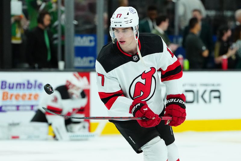 Mar 17, 2024; Las Vegas, Nevada, USA; New Jersey Devils defenseman Simon Nemec (17) warms up before a game against the Vegas Golden Knights at T-Mobile Arena. Mandatory Credit: Stephen R. Sylvanie-USA TODAY Sports