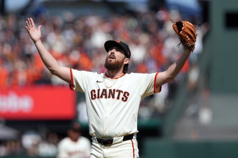 May 3, 2025; San Francisco, California, USA; San Francisco Giants relief pitcher Ryan Walker (74) gestures after defeating the Colorado Rockies at Oracle Park. Mandatory Credit: Darren Yamashita-Imagn Images
