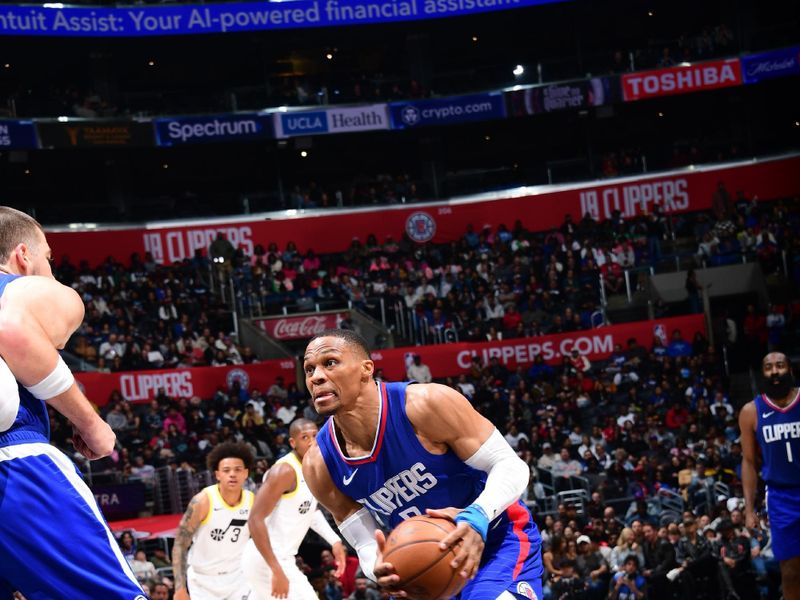 LOS ANGELES, CA - APRIL 5:  Russell Westbrook #0 of the LA Clippers goes to the basket during the game on April 5, 2024 at Crypto.Com Arena in Los Angeles, California. NOTE TO USER: User expressly acknowledges and agrees that, by downloading and/or using this Photograph, user is consenting to the terms and conditions of the Getty Images License Agreement. Mandatory Copyright Notice: Copyright 2024 NBAE (Photo by Adam Pantozzi/NBAE via Getty Images)