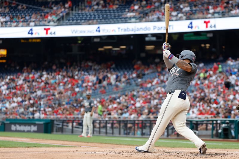 Jul 20, 2024; Washington, District of Columbia, USA; Washington Nationals outfielder Harold Ramírez (43) hits a two run home run against the Cincinnati Reds during the first inning at Nationals Park. Mandatory Credit: Geoff Burke-USA TODAY Sports