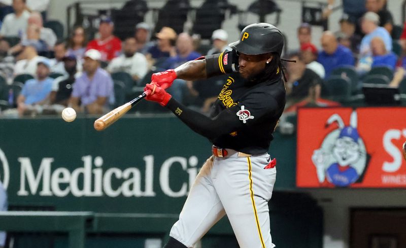 Aug 20, 2024; Arlington, Texas, USA; Pittsburgh Pirates designated hitter Oneil Cruz (15) hits a double during the seventh inning against the Texas Rangers at Globe Life Field. Mandatory Credit: Kevin Jairaj-USA TODAY Sports