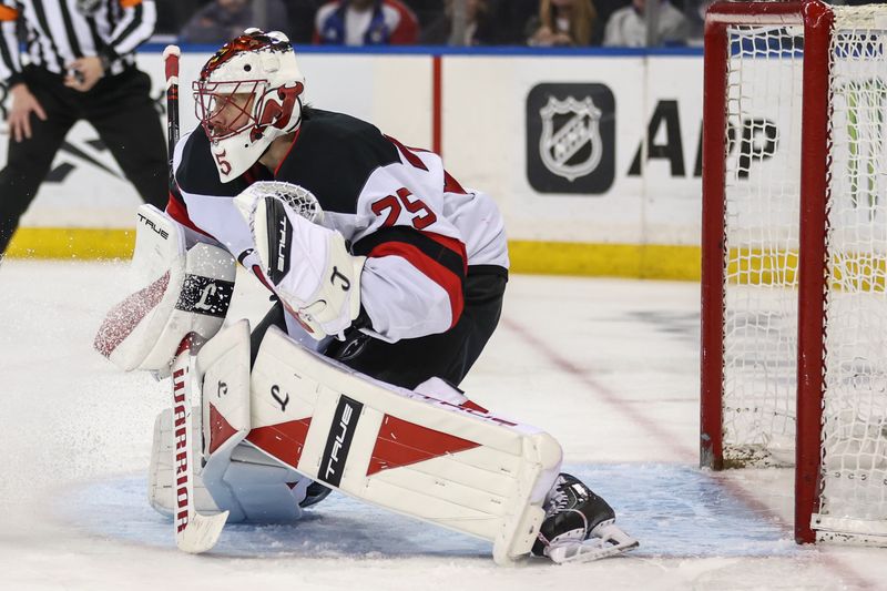 Mar 31, 2026; New York, New York, USA; New Jersey Devils goaltender Jacob Markstrom (25) defends the net in the second period against the New York Rangers at Madison Square Garden. Mandatory Credit: Wendell Cruz-Imagn Images Mar 31, 2026; New York, New York, USA; New Jersey Devils goaltender Jacob Markstrom (25) defends the net in the second period against the New York Rangers at Madison Square Garden. Mandatory Credit: Wendell Cruz-Imagn Images