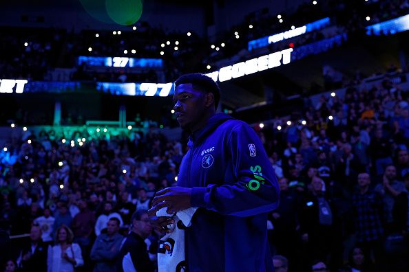 MINNEAPOLIS, MINNESOTA - NOVEMBER 01: Anthony Edwards #5 of the Minnesota Timberwolves looks on during player introductions prior to the start of the game against the Denver Nuggets at Target Center on November 01, 2023 in Minneapolis, Minnesota. The Timberwolves defeated the Nuggets 110-89. NOTE TO USER: User expressly acknowledges and agrees that, by downloading and or using this photograph, User is consenting to the terms and conditions of the Getty Images License Agreement. (Photo by David Berding/Getty Images)