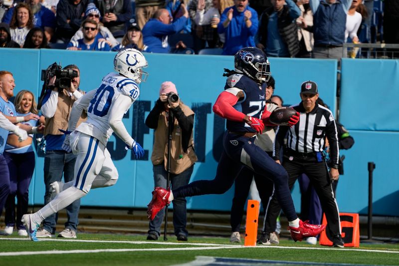 Tennessee Titans' Derrick Henry (22) runs past Indianapolis Colts' Jaylon Jones (40) for a touchdown during the first half of an NFL football game, Sunday, Dec. 3, 2023, in Nashville, Tenn. (AP Photo/George Walker IV)