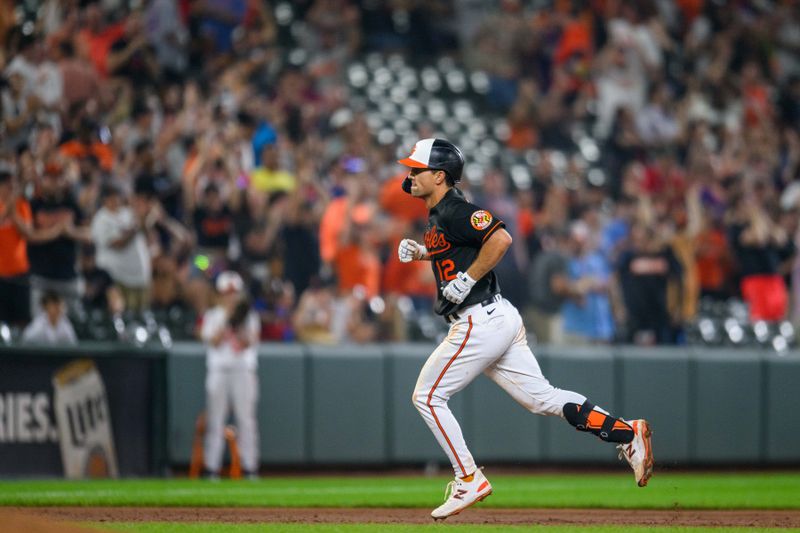 Jun 28, 2023; Baltimore, Maryland, USA; Baltimore Orioles second baseman Adam Frazier (12) rounds the bases after hitting a home run during the eighth inning against the Cincinnati Reds at Oriole Park at Camden Yards. Mandatory Credit: Reggie Hildred-USA TODAY Sports