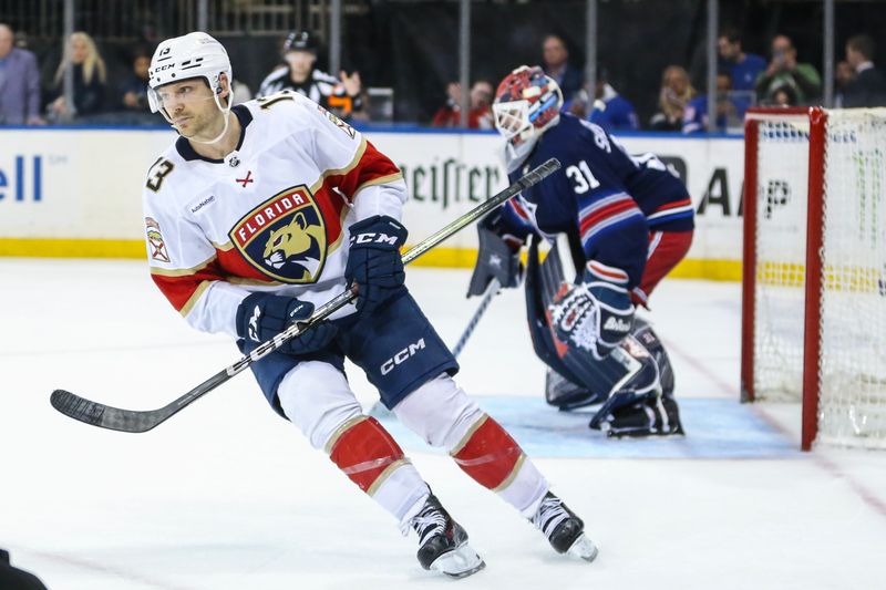 Mar 23, 2024; New York, New York, USA; Florida Panthers center Sam Reinhart (13) circles back after scoring a goal during a shootout in overtime against the New York Rangers at Madison Square Garden. Mandatory Credit: Wendell Cruz-USA TODAY Sports