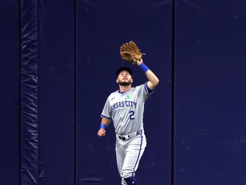 May 24, 2024; St. Petersburg, Florida, USA;  Kansas City Royals outfielder Garrett Hampson (2) catches a fly ball against the Tampa Bay Rays during the first inning at Tropicana Field. Mandatory Credit: Kim Klement Neitzel-USA TODAY Sports