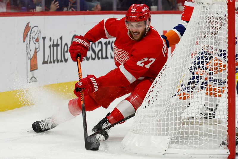 Nov 5, 2022; Detroit, Michigan, USA;  Detroit Red Wings center Michael Rasmussen (27) skates with the puck in the second period against the New York Islanders at Little Caesars Arena. Mandatory Credit: Rick Osentoski-USA TODAY Sports