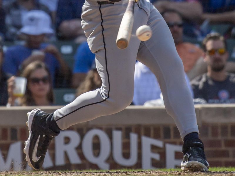 Aug 22, 2024; Chicago, Illinois, USA; Detroit Tigers shortstop Javier Baez (28) singles during the eighth inning against the Chicago Cubs at Wrigley Field. Mandatory Credit: Patrick Gorski-USA TODAY Sports