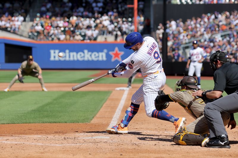 Sep 18, 2025; New York City, New York, USA; New York Mets left fielder Brandon Nimmo (9) hits a three run home run against the San Diego Padres during the third inning at Citi Field. Mandatory Credit: Brad Penner-Imagn Images