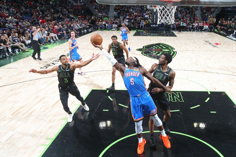 NEW ORLEANS, LA - JANUARY 26: Luguentz Dort #5 of the Oklahoma City Thunder rebounds during the game against the New Orleans Pelicans on January 26, 2024 at the Smoothie King Center in New Orleans, Louisiana. NOTE TO USER: User expressly acknowledges and agrees that, by downloading and or using this Photograph, user is consenting to the terms and conditions of the Getty Images License Agreement. Mandatory Copyright Notice: Copyright 2024 NBAE (Photo by Layne Murdoch Jr./NBAE via Getty Images)