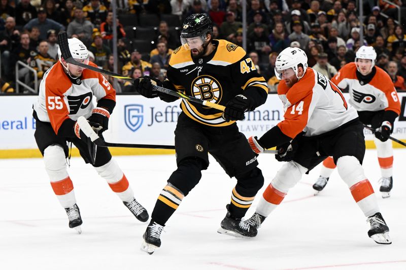 Oct 29, 2024; Boston, Massachusetts, USA; Boston Bruins center Mark Kastelic (47) battles for the puck against Philadelphia Flyers defenseman Rasmus Ristolainen (55) and center Sean Couturier (14) during the first period at TD Garden. Mandatory Credit: Brian Fluharty-Imagn Images