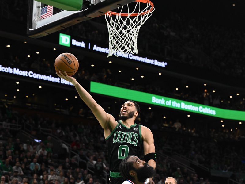 BOSTON, MASSACHUSETTS - JANUARY 27: Jayson Tatum #0 of the Boston Celtics attempts a layup against the LA Clippers during the first quarter at the TD Garden on January 27, 2024 in Boston, Massachusetts. NOTE TO USER: User expressly acknowledges and agrees that, by downloading and or using this photograph, User is consenting to the terms and conditions of the Getty Images License Agreement. (Photo by Brian Fluharty/Getty Images)