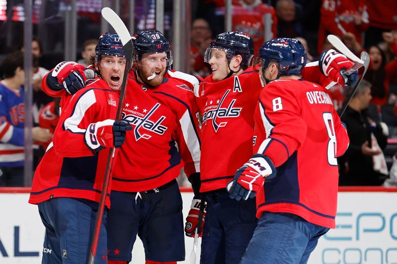 Mar 3, 2024; Washington, District of Columbia, USA; Washington Capitals right wing Anthony Mantha (39) celebrates with teammates after scoring a goal against the Arizona Coyotes in the third period at Capital One Arena. Mandatory Credit: Geoff Burke-USA TODAY Sports