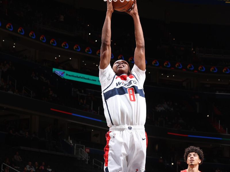 WASHINGTON, DC -? OCTOBER 11: Carlton Carrington #8 of the Washington Wizards dunks the ball during the game against the Toronto Raptors during a NBA preseason game on October 11, 2024 at Capital One Arena in Washington, DC. NOTE TO USER: User expressly acknowledges and agrees that, by downloading and or using this Photograph, user is consenting to the terms and conditions of the Getty Images License Agreement. Mandatory Copyright Notice: Copyright 2024 NBAE (Photo by Stephen Gosling/NBAE via Getty Images)