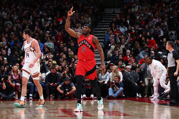 TORONTO, CANADA - NOVEMBER 29: Precious Achiuwa #5 of the Toronto Raptors celebrates during the game against the Phoenix Suns on November 29, 2023 at the Scotiabank Arena in Toronto, Ontario, Canada.  NOTE TO USER: User expressly acknowledges and agrees that, by downloading and or using this Photograph, user is consenting to the terms and conditions of the Getty Images License Agreement.  Mandatory Copyright Notice: Copyright 2023 NBAE (Photo by Vaughn Ridley/NBAE via Getty Images)