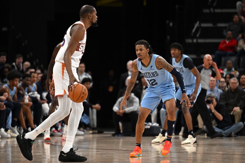 MEMPHIS, TN - FEBRUARY 25: Ja Morant #12 of the Memphis Grizzlies plays defense during the game against the Phoenix Suns on February 25, 2025 at FedExForum in Memphis, Tennessee. NOTE TO USER: User expressly acknowledges and agrees that, by downloading and or using this photograph, User is consenting to the terms and conditions of the Getty Images License Agreement. Mandatory Copyright Notice: Copyright 2025 NBAE(Photo by Grant Burke/NBAE via Getty Images)