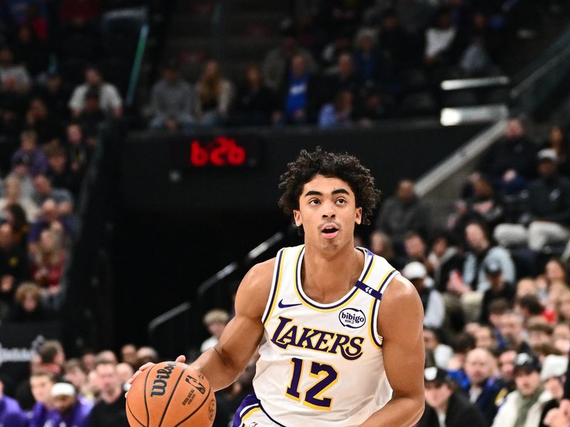 SALT LAKE CITY, UT - DECEMBER 1: Max Christie #12 of the Los Angeles Lakers drives to the basket during the game against the Utah Jazz on December 1, 2024 at Delta Center in Salt Lake City, Utah. NOTE TO USER: User expressly acknowledges and agrees that, by downloading and or using this Photograph, User is consenting to the terms and conditions of the Getty Images License Agreement. Mandatory Copyright Notice: Copyright 2024 NBAE (Photo by Jamie Sabau/NBAE via Getty Images)