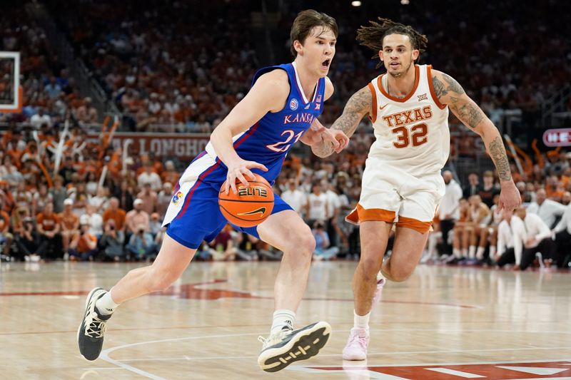 Mar 4, 2023; Austin, Texas, USA; Kansas Jayhawks forward Zach Clemence (21) drives on Texas Longhorns forward Christian Bishop (32) during the second half at Moody Center. Mandatory Credit: Scott Wachter-USA TODAY Sports