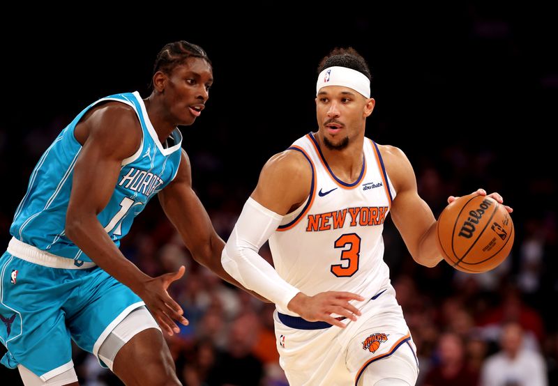 NEW YORK, NEW YORK - DECEMBER 05:  Josh Hart #3 of the New York Knicks drives against Moussa Diabate #14 of the Charlotte Hornets during their game at Madison Square Garden on December 05, 2024 in New York City.  User expressly acknowledges and agrees that, by downloading and or using this photograph, User is consenting to the terms and conditions of the Getty Images License Agreement.  (Photo by Al Bello/Getty Images)