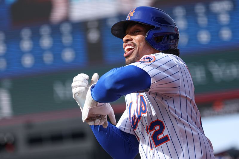 Apr 20, 2025; New York City, New York, USA; New York Mets shortstop Francisco Lindor (12) reacts after an infield single during the seventh inning against the St. Louis Cardinals at Citi Field. Mandatory Credit: Vincent Carchietta-Imagn Images