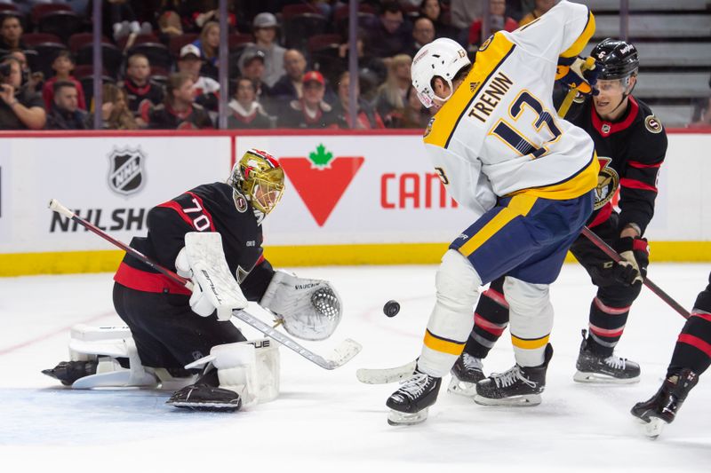 Jan 29, 2024; Ottawa, Ontario, CAN; Ottawa Senators goalie Joonas Korpisalo (70) makes a save in front of Nashville Predators center Yakov Trenin (13) in the second period at the Canadian Tire Centre. Mandatory Credit: Marc DesRosiers-USA TODAY Sports