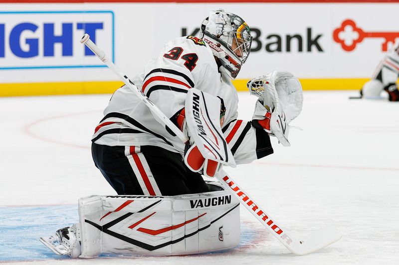 Oct 28, 2024; Denver, Colorado, USA; Chicago Blackhawks goaltender Petr Mrazek (34) warms up before the game against the Colorado Avalanche at Ball Arena. Mandatory Credit: Isaiah J. Downing-Imagn Images