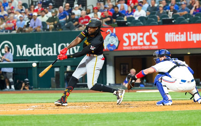Aug 20, 2024; Arlington, Texas, USA; Pittsburgh Pirates designated hitter Oneil Cruz (15) hits an rbi triple during the fourth inning against the Texas Rangers at Globe Life Field. Mandatory Credit: Kevin Jairaj-USA TODAY Sports