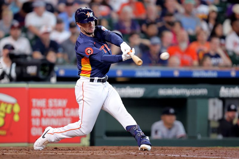 Jun 1, 2024; Houston, Texas, USA; Houston Astros third baseman Alex Bregman (2) hits a double against the Minnesota Twins during the third inning at Minute Maid Park. Mandatory Credit: Erik Williams-USA TODAY Sports