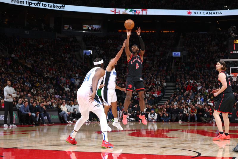 TORONTO, CANADA - JANUARY 3: Immanuel Quickley #5 of the Toronto Raptors shoots a three point basket during the game against the Orlando Magic on January 3, 2025 at the Scotiabank Arena in Toronto, Ontario, Canada.  NOTE TO USER: User expressly acknowledges and agrees that, by downloading and or using this Photograph, user is consenting to the terms and conditions of the Getty Images License Agreement.  Mandatory Copyright Notice: Copyright 2025 NBAE (Photo by Vaughn Ridley/NBAE via Getty Images)