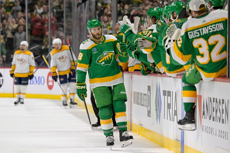 Mar 10, 2024; Saint Paul, Minnesota, USA;  Minnesota Wild forward Ryan Hartman (38) celebrates his goal against the Nashville Predators during the third period at Xcel Energy Center. Mandatory Credit: Nick Wosika-USA TODAY Sports

