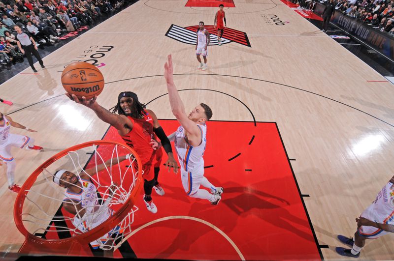 PORTLAND, OR - JANUARY 26: Robert Williams III #35 of the Portland Trail Blazers drives to the basket during the game against the Oklahoma City Thunder on January 26, 2025 at the Moda Center Arena in Portland, Oregon. NOTE TO USER: User expressly acknowledges and agrees that, by downloading and or using this photograph, user is consenting to the terms and conditions of the Getty Images License Agreement. Mandatory Copyright Notice: Copyright 2025 NBAE (Photo by Cameron Browne/NBAE via Getty Images)