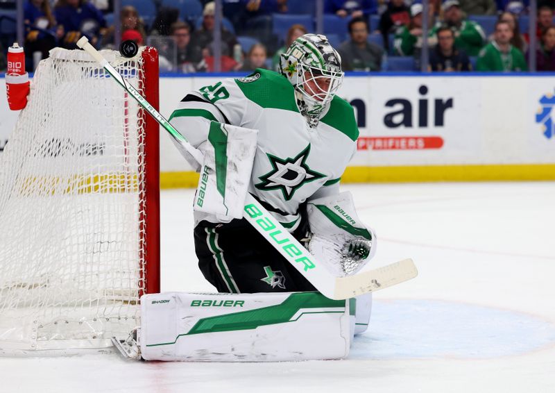 Feb 6, 2024; Buffalo, New York, USA;  Dallas Stars goaltender Jake Oettinger (29) makes a stick save during the second period against the Buffalo Sabres at KeyBank Center. Mandatory Credit: Timothy T. Ludwig-USA TODAY Sports