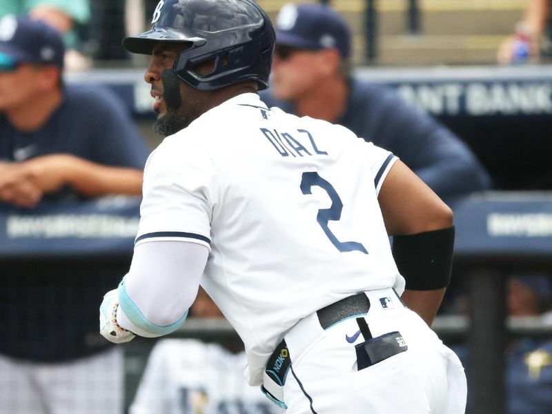 May 1, 2025; St. Petersburg, Florida, USA;  Tampa Bay Rays designated hitter Yandy Diaz (2) hits a home run against the Kansas City Royals during the first inning at George M. Steinbrenner Field. Mandatory Credit: Kim Klement Neitzel-Imagn Images