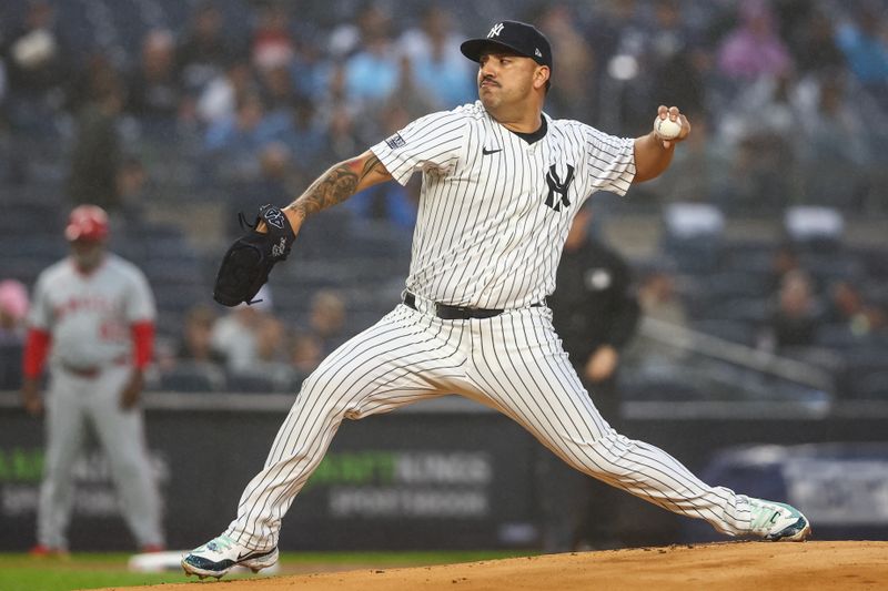 Aug 8, 2024; Bronx, New York, USA;  New York Yankees starting pitcher Nestor Cortes (65) pitches in the first inning against the Los Angeles Angels at Yankee Stadium. Mandatory Credit: Wendell Cruz-USA TODAY Sports