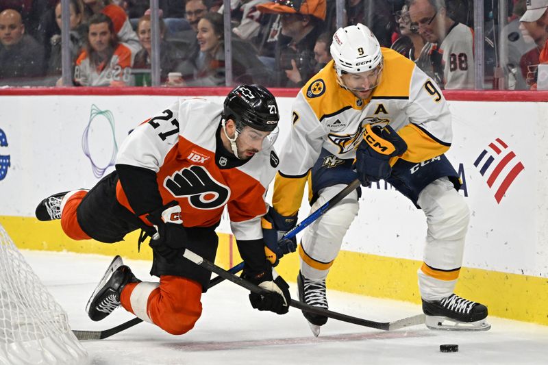 Oct 30, 2025; Philadelphia, Pennsylvania, USA; Philadelphia Flyers left wing Noah Cates (27) and Nashville Predators left wing Filip Forsberg (9) battle for the puck during the second period at Xfinity Mobile Arena. Mandatory Credit: Eric Hartline-Imagn Images