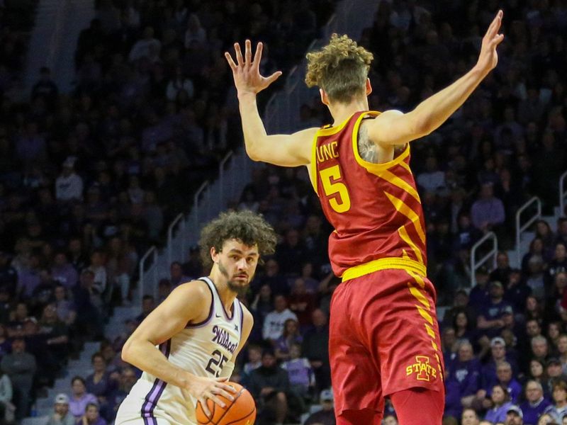 Feb 18, 2023; Manhattan, Kansas, USA; Kansas State Wildcats forward Ismael Massoud (25) is guarded by Iowa State Cyclones forward Alja   Kun   (5) during the first half at Bramlage Coliseum. Mandatory Credit: Scott Sewell-USA TODAY Sports