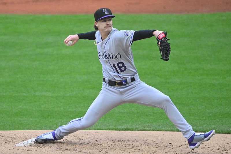 Apr 25, 2023; Cleveland, Ohio, USA; Colorado Rockies starting pitcher Ryan Feltner (18) delivers during the first inning against the Cleveland Guardians at Progressive Field. Mandatory Credit: David Richard-USA TODAY Sports