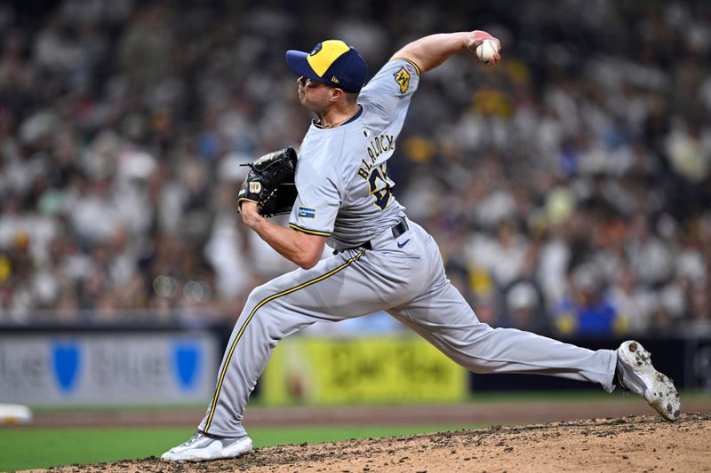Jun 20, 2024; San Diego, California, USA; Milwaukee Brewers relief pitcher Bradley Blalock (25) pitches against the San Diego Padres during the eighth inning at Petco Park. Mandatory Credit: Orlando Ramirez-USA TODAY Sports