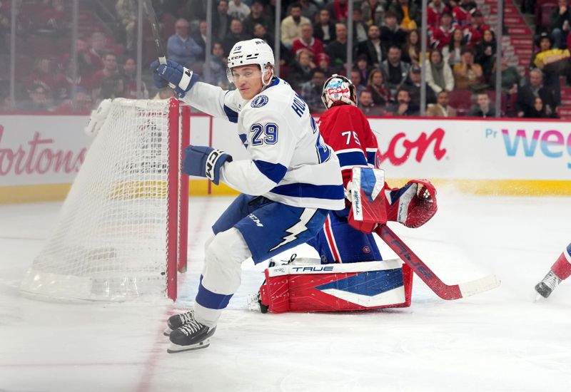 Dec 9, 2025; Montreal, Quebec, CAN; Tampa Bay Lightning forward Pontus Holmberg (29) celebrates after scoring a goal against Montreal Canadiens goalie Jakub Dobes (75) during the first period at the Bell Centre. Mandatory Credit: Eric Bolte-Imagn Images